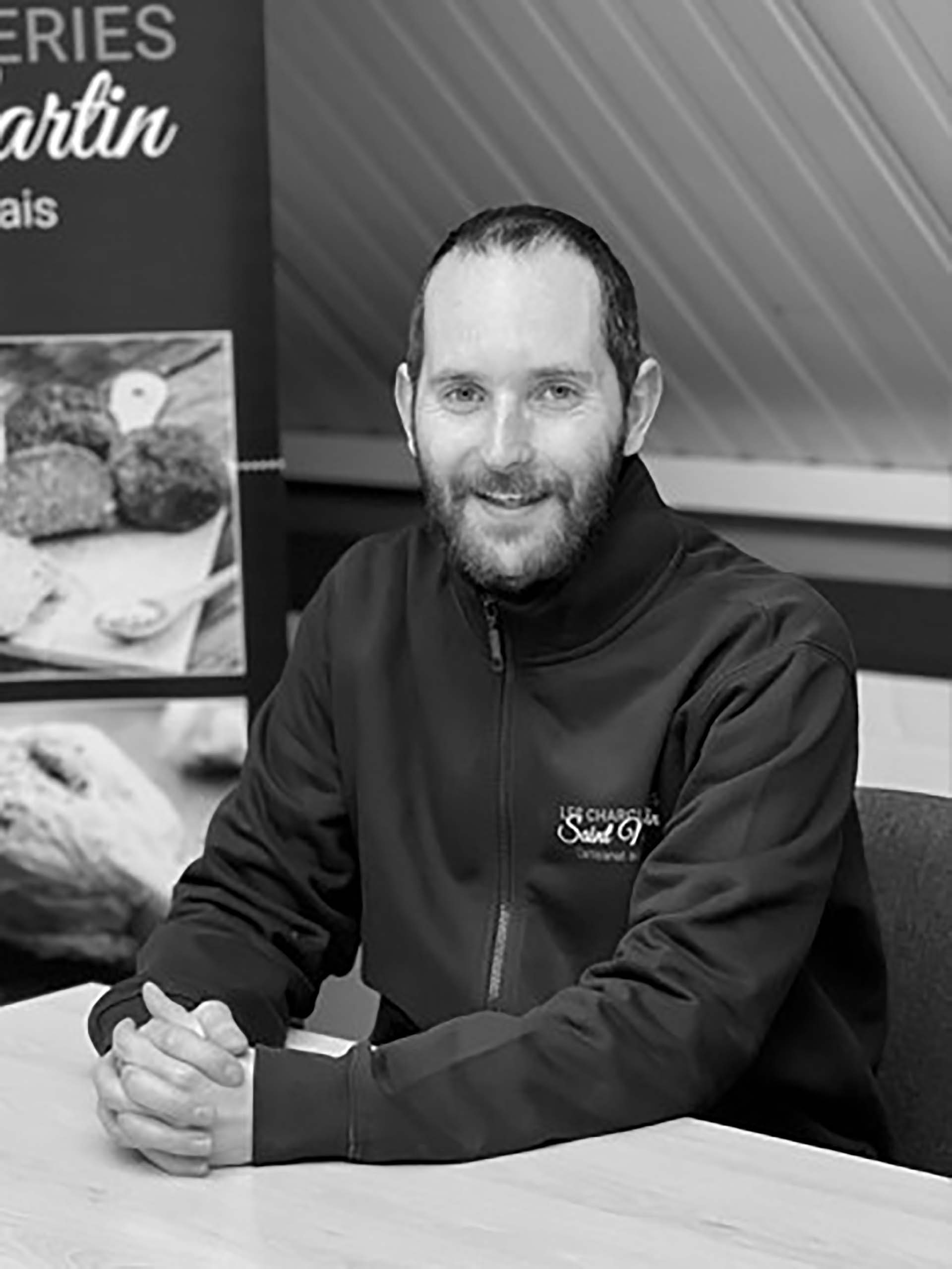 photo de face d'un employé de chez les charcuterie saint martin